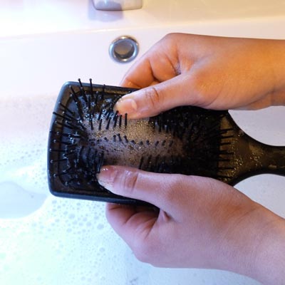 clean brush with water